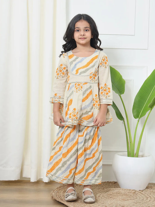 Cream color kurti and sharara