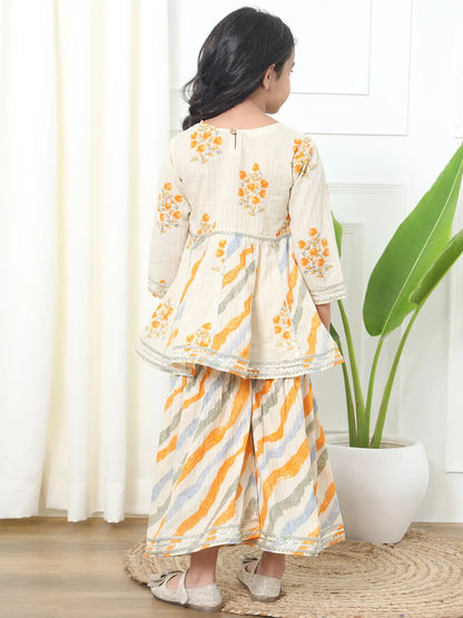 Cream color kurti and sharara